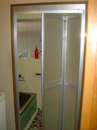 �������܃h�A