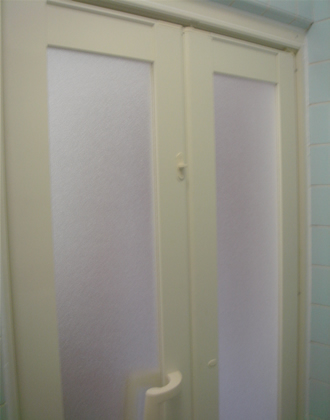 �������܃h�A